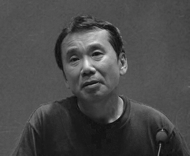 Murakami lecturing at MIT in 2005. Via Wiki Commons